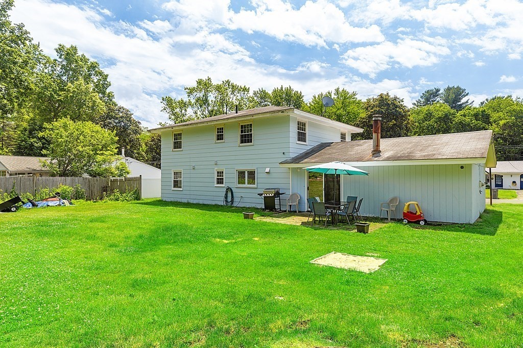 8 Winifred Road Framingham, MA 01701 - Photo 32 of 40 a view of a house with a yard