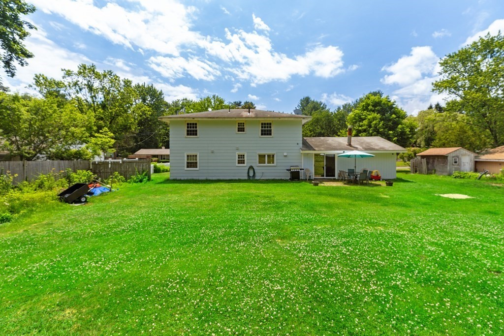 8 Winifred Road Framingham, MA 01701 - Photo 33 of 40 a view of a house with backyard and sitting area