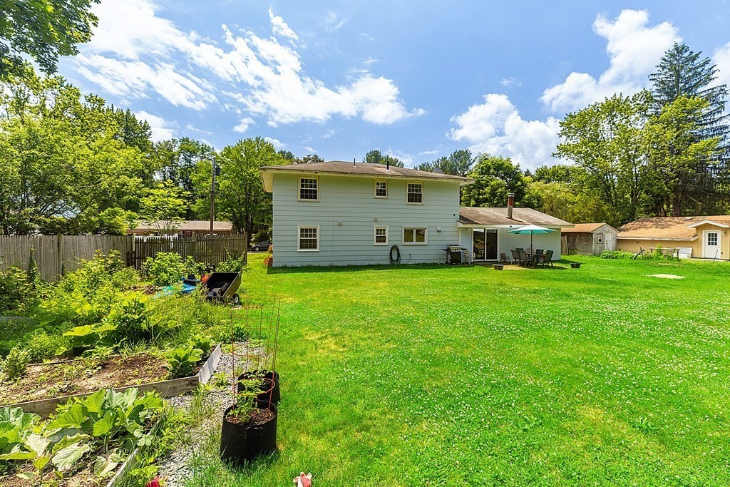 8 Winifred Road Framingham, MA 01701 - Photo 35 of 40 a view of a house with a yard