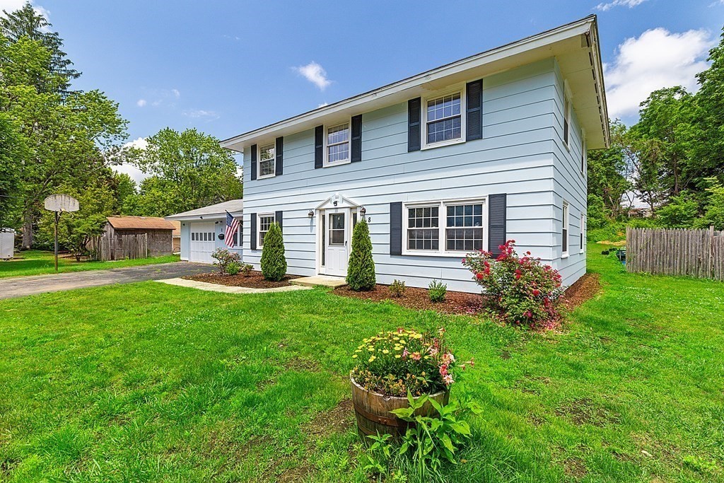8 Winifred Road Framingham, MA 01701 - Photo 39 of 40 a front view of a house with garden