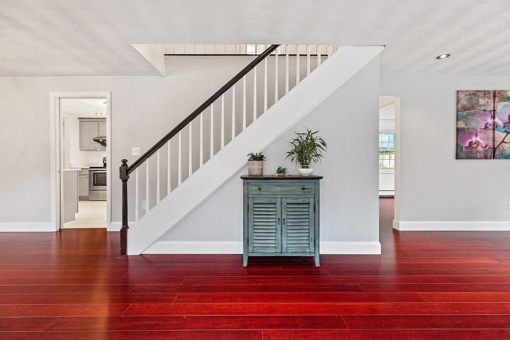 8 Winifred Road Framingham, MA 01701 - Photo 5 of 40 a view of entryway and hall with wooden floor