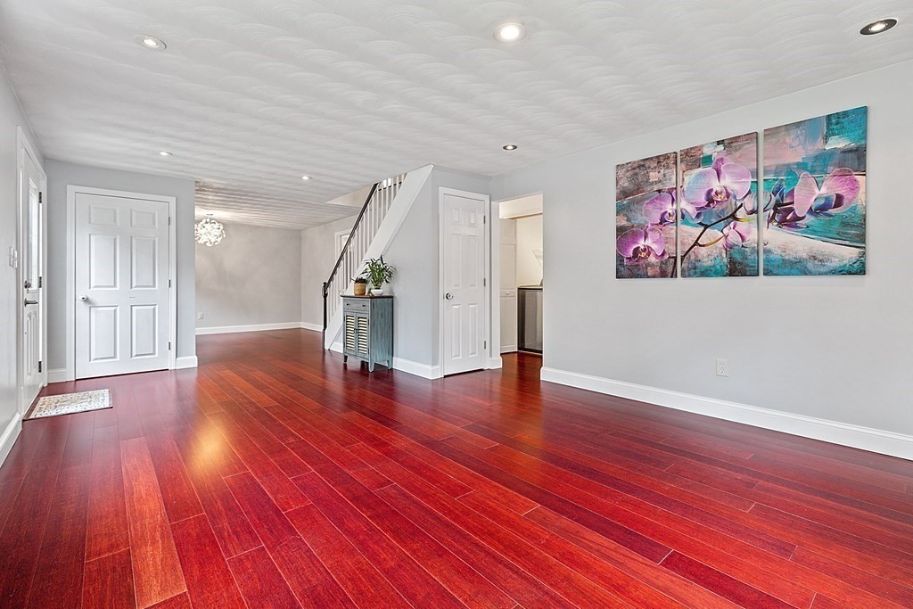 8 Winifred Road Framingham, MA 01701 - Photo 6 of 40 a view of an empty room with wooden floor