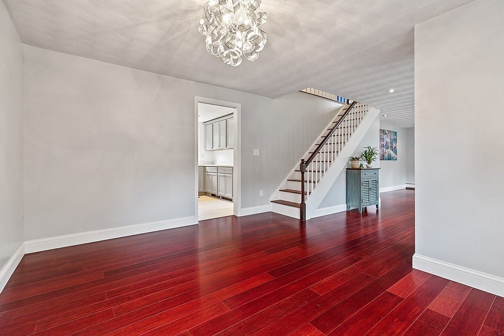 8 Winifred Road Framingham, MA 01701 - Photo 9 of 40 a view of entryway with wooden floor