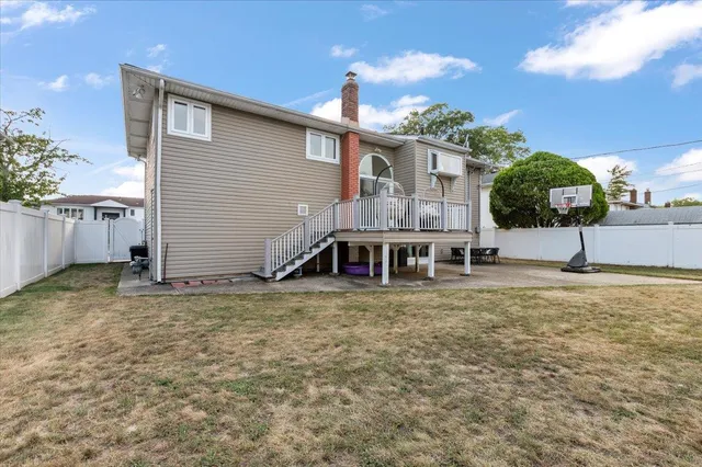 a house view with a garden space