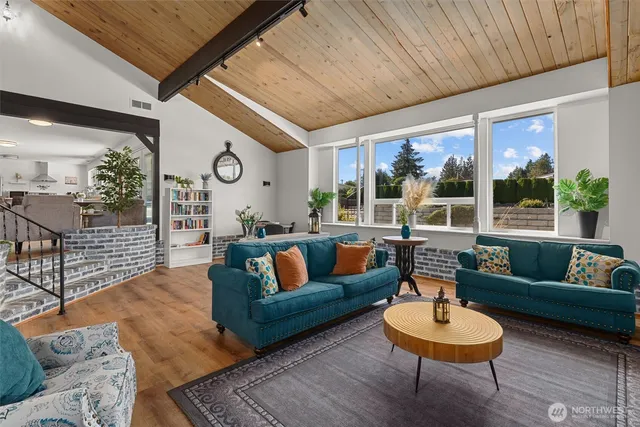 a view of a patio with a table and chairs