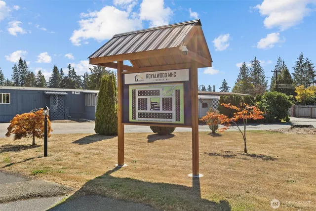 a street sign on a brick wall