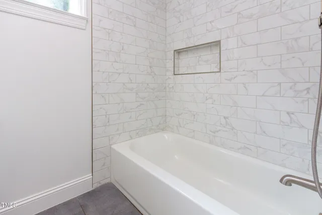 a bathroom with a bathtub