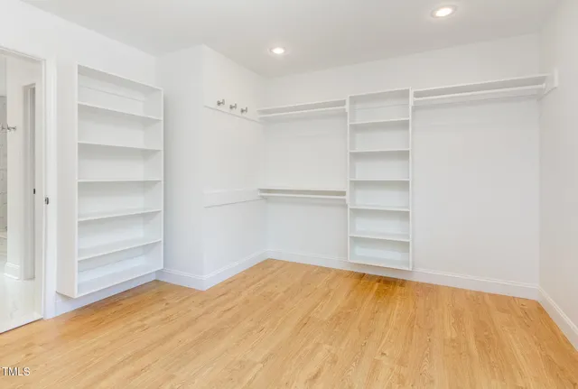 a view of a room with storage and utility room