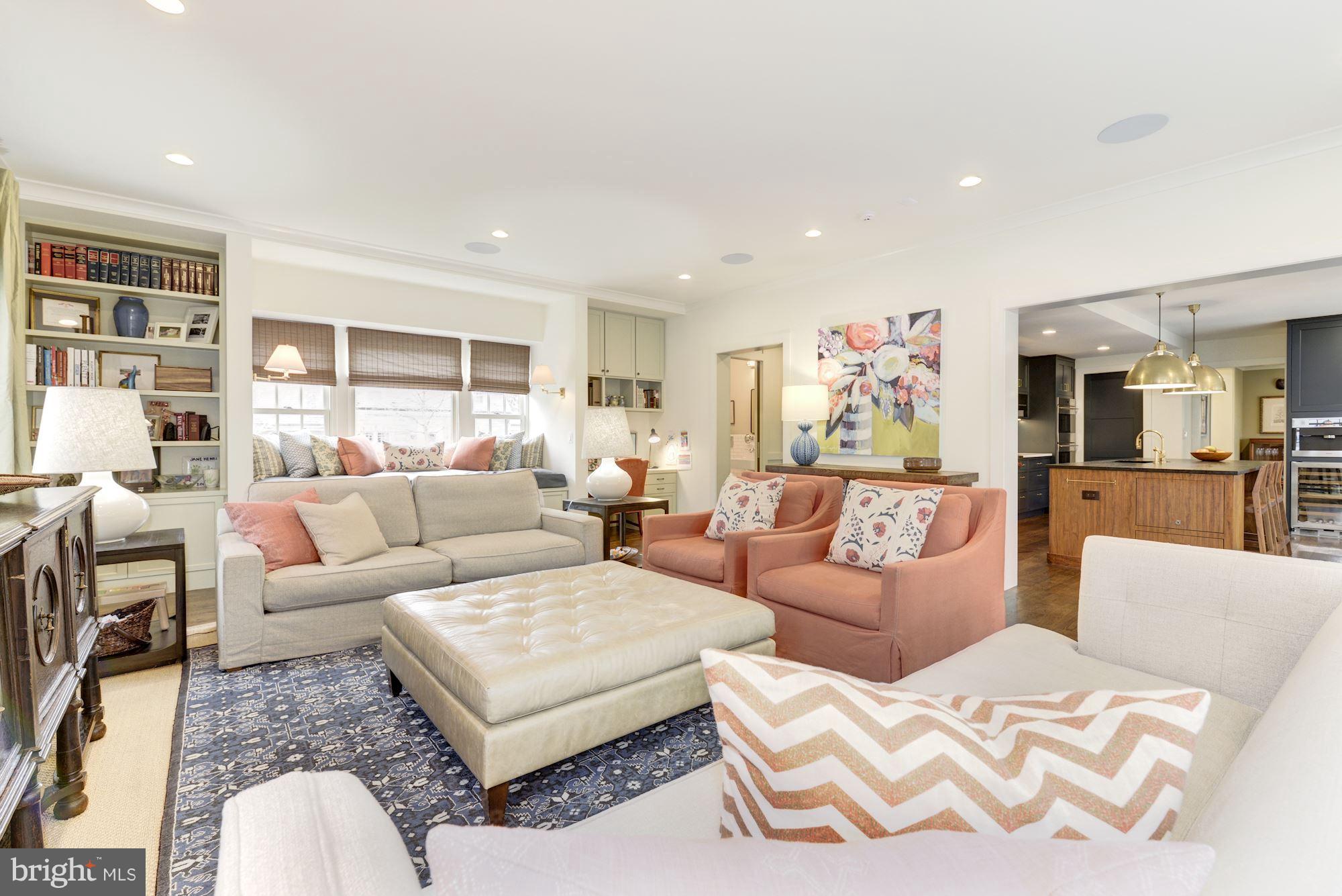 6134 Nevada Avenue Chevy Chase, MD 20815 - Photo 11 of 30 a living room with furniture and a view of kitchen