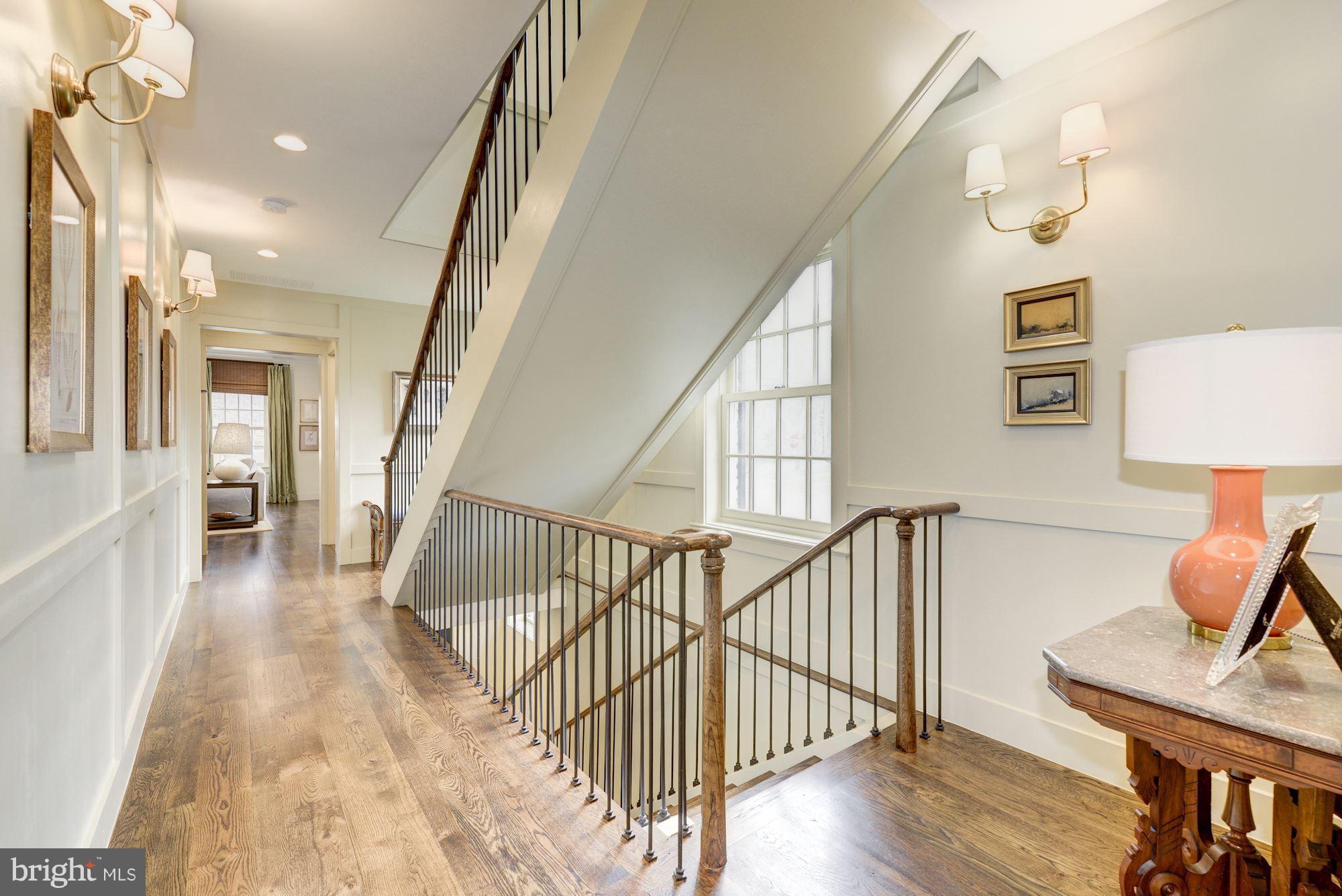 6134 Nevada Avenue Chevy Chase, MD 20815 - Photo 13 of 30 a view of entryway and hall with wooden floor