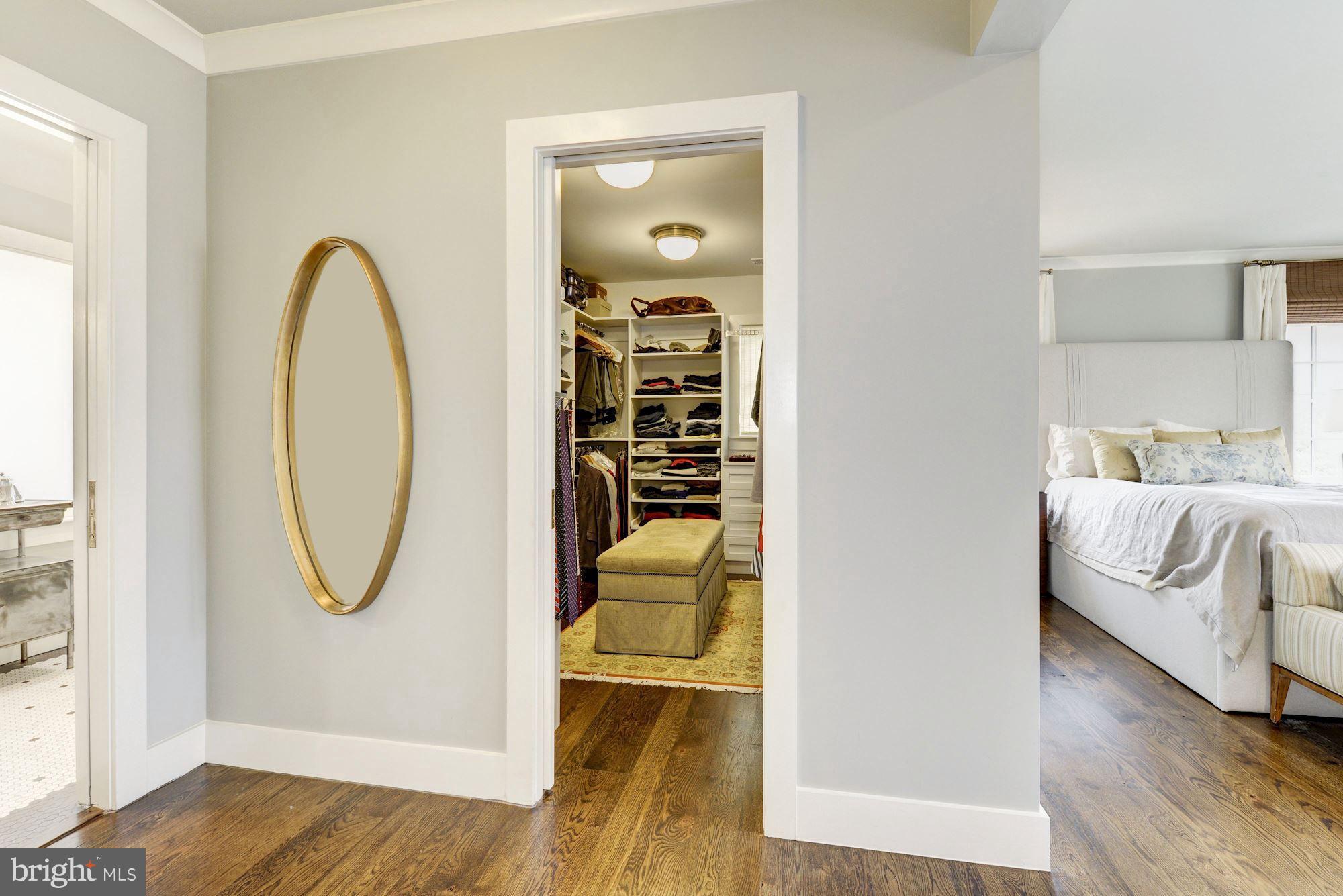 6134 Nevada Avenue Chevy Chase, MD 20815 - Photo 16 of 30 a view of a bedroom with a bed and wooden floor