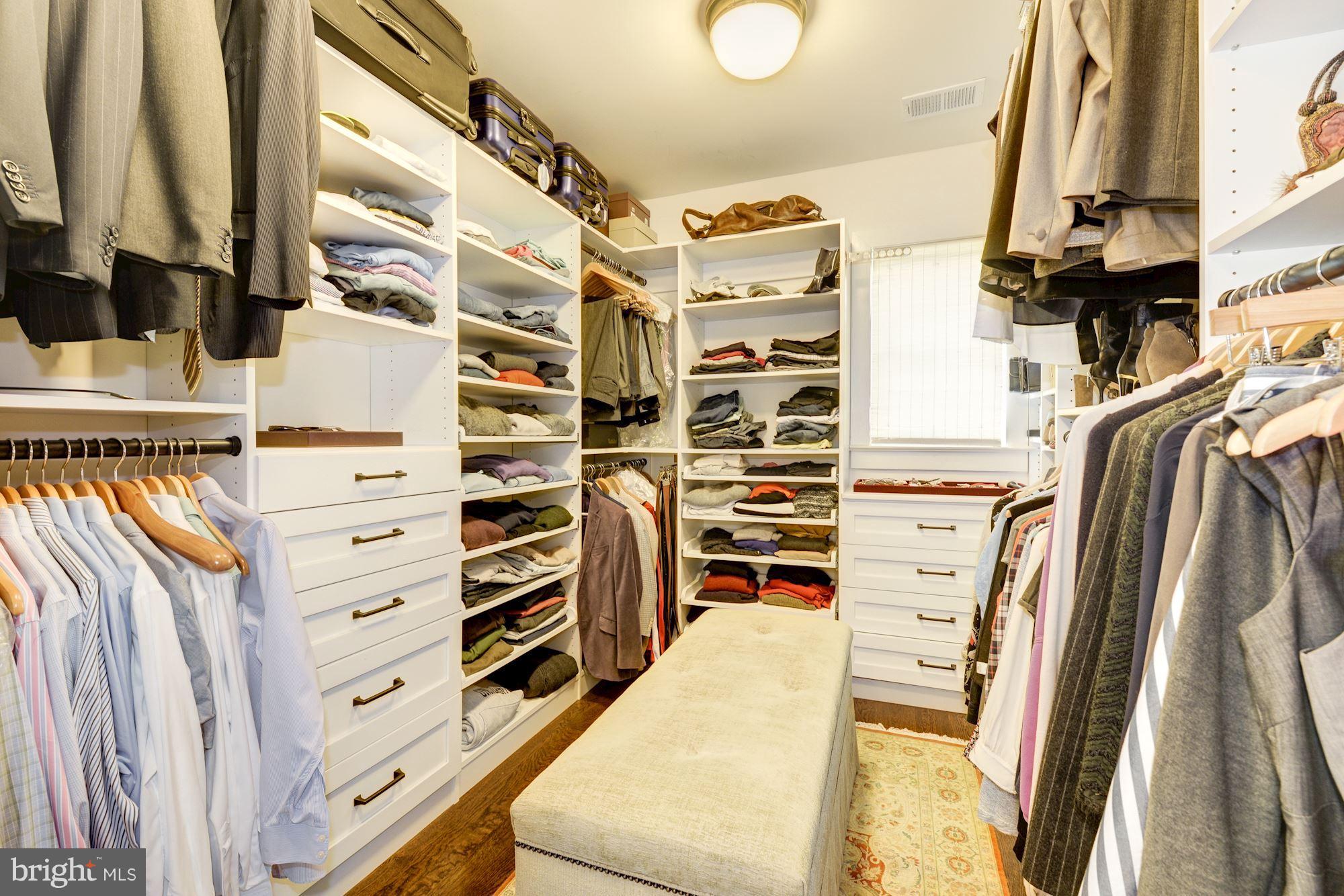 6134 Nevada Avenue Chevy Chase, MD 20815 - Photo 18 of 30 a view of walk in closet with clothes and shoes