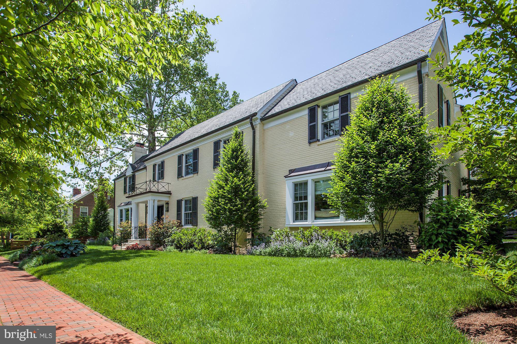 6134 Nevada Avenue Chevy Chase, MD 20815 - Photo 29 of 30 a front view of a house with a yard