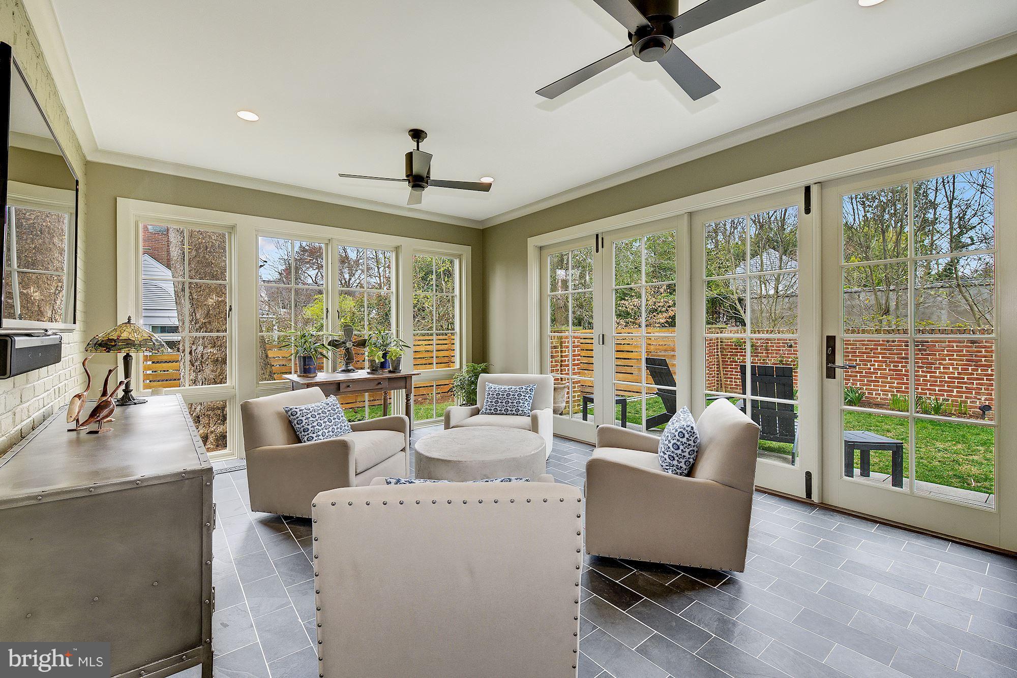 6134 Nevada Avenue Chevy Chase, MD 20815 - Photo 7 of 30 a living room with furniture and a large window