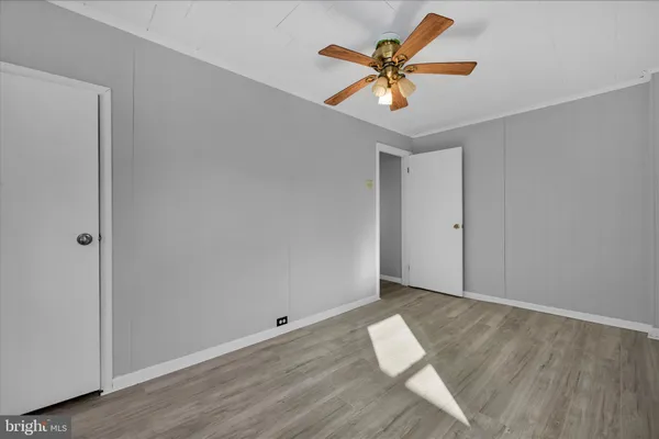 a view of workspace with wooden floor