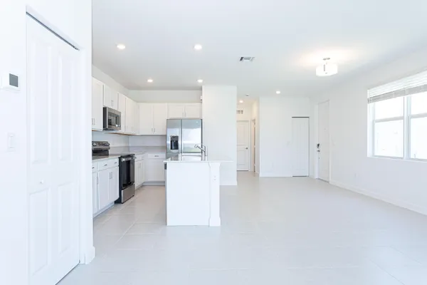 an aerial view of a house with a ocean view