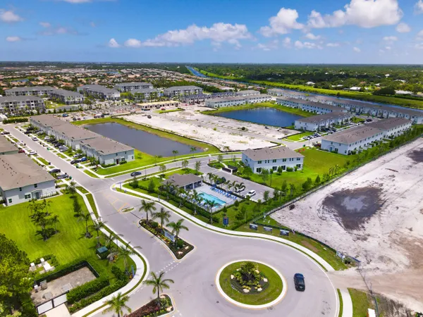 an aerial view of a house with a garden