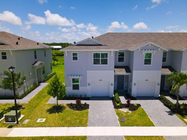 a front view of house with yard