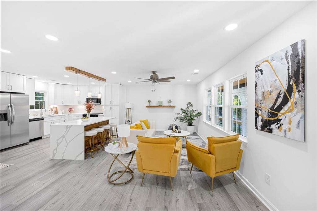 3892 Northstrand Drive Decatur, GA 30035 - Photo 11 of 25 a living room with furniture and kitchen view