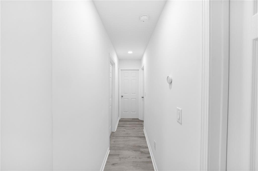 3892 Northstrand Drive Decatur, GA 30035 - Photo 15 of 25 a view of a hallway with wooden floor