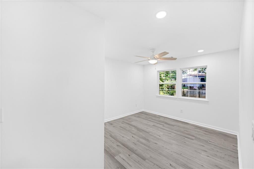 3892 Northstrand Drive Decatur, GA 30035 - Photo 16 of 25 a view of an empty room with a window