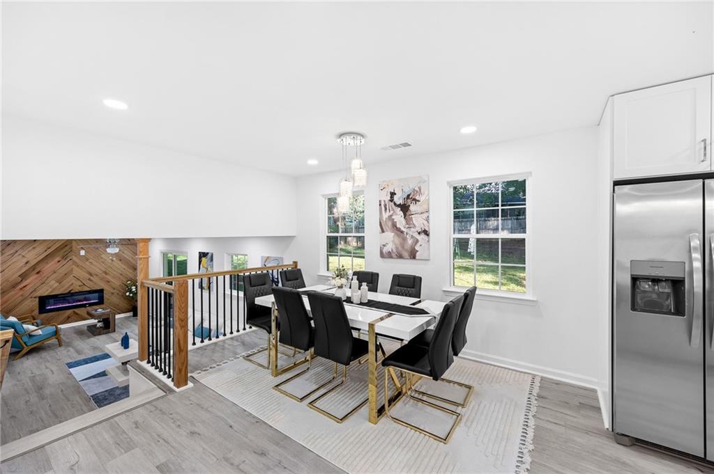 3892 Northstrand Drive Decatur, GA 30035 - Photo 10 of 25 a view of a dining room with furniture window and wooden floor