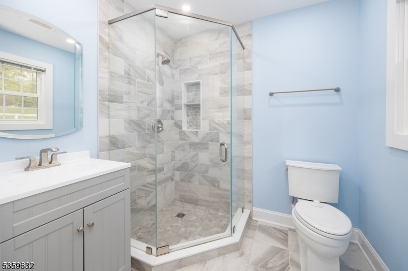 1625 Highway 206 Chester, NJ 07930 - Photo 21 of 46 a bathroom with a shower a toilet and sink