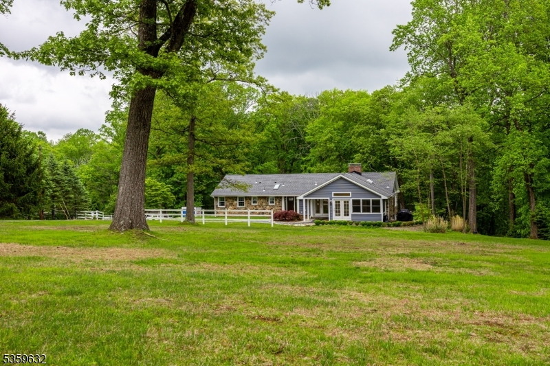 1625 Highway 206 Chester, NJ 07930 - Photo 32 of 46 a front view of a house with a yard