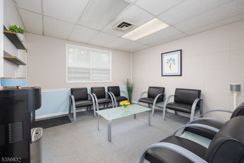 1625 Highway 206 Chester, NJ 07930 - Photo 34 of 46 a living room with furniture and a window