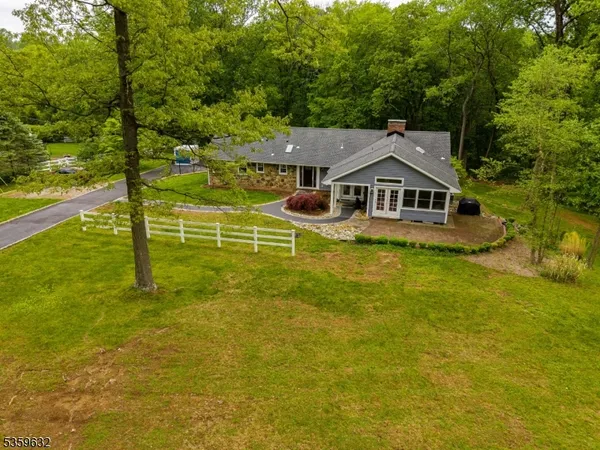 a view of a house with a big yard