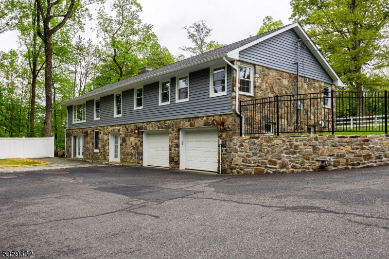 1625 Highway 206 Chester, NJ 07930 - Photo 10 of 46 a view of a house with a yard and plants