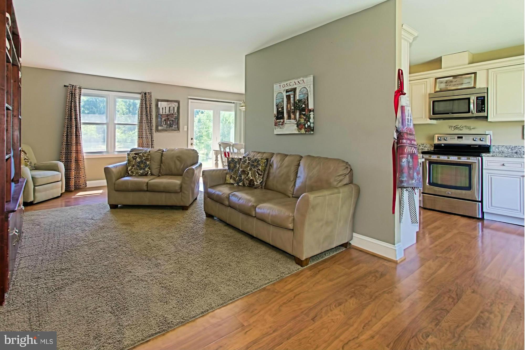 2329 Rosedown Drive Reston, VA 20191 - Photo 3 of 30 Spacious Living Room Opens to the Kitchen