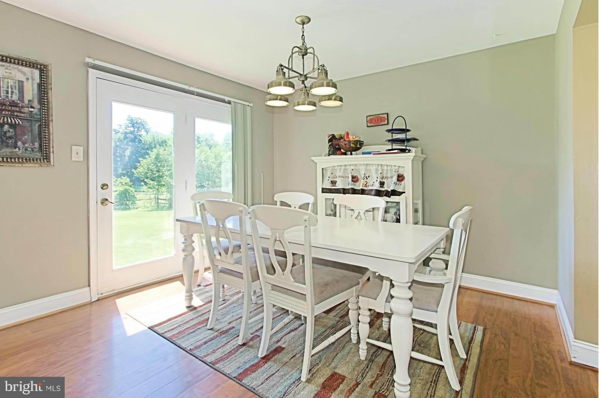 2329 Rosedown Drive Reston, VA 20191 - Photo 5 of 30 Dining Room Opens to Beautiful Backyard