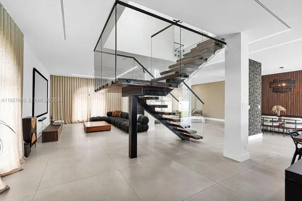 a kitchen with stainless steel appliances a sink and a stove