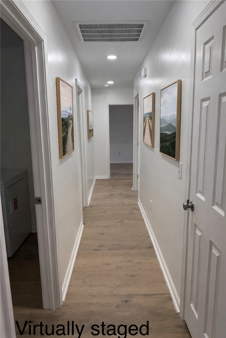 701 Delia Street, Unit B Anderson, SC 29624 - Photo 10 of 25 This spacious hallway offers a bright and inviting path to various rooms within the home.