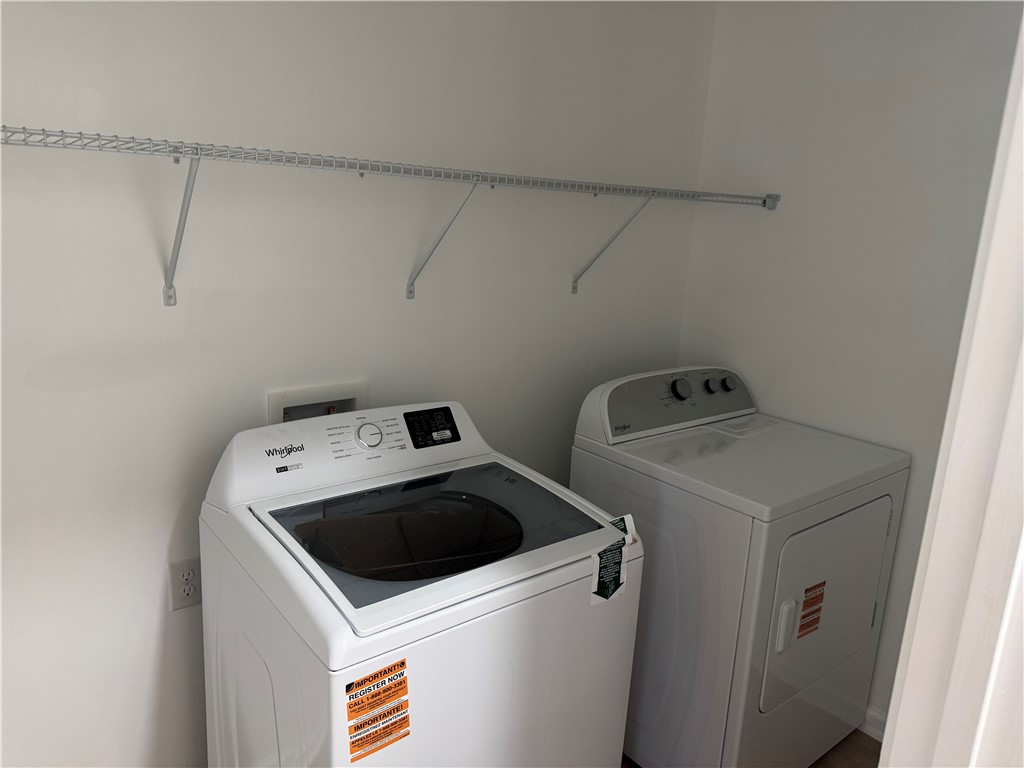 701 Delia Street, Unit B Anderson, SC 29624 - Photo 15 of 25 This dedicated laundry space offers convenience and efficiency for daily chores.
