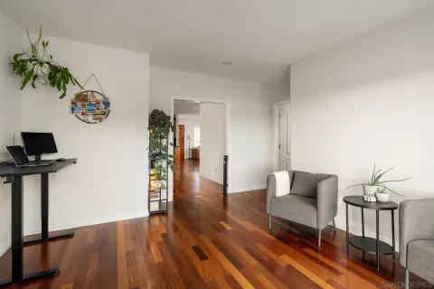 a view of livingroom with furniture and wooden floor