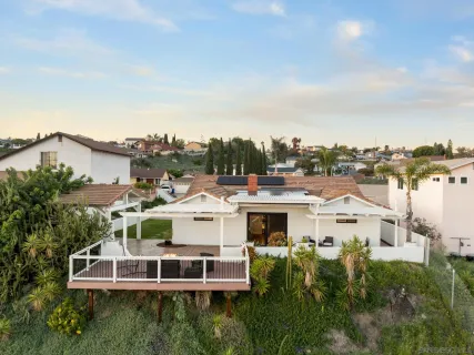 a large white building with a white roof