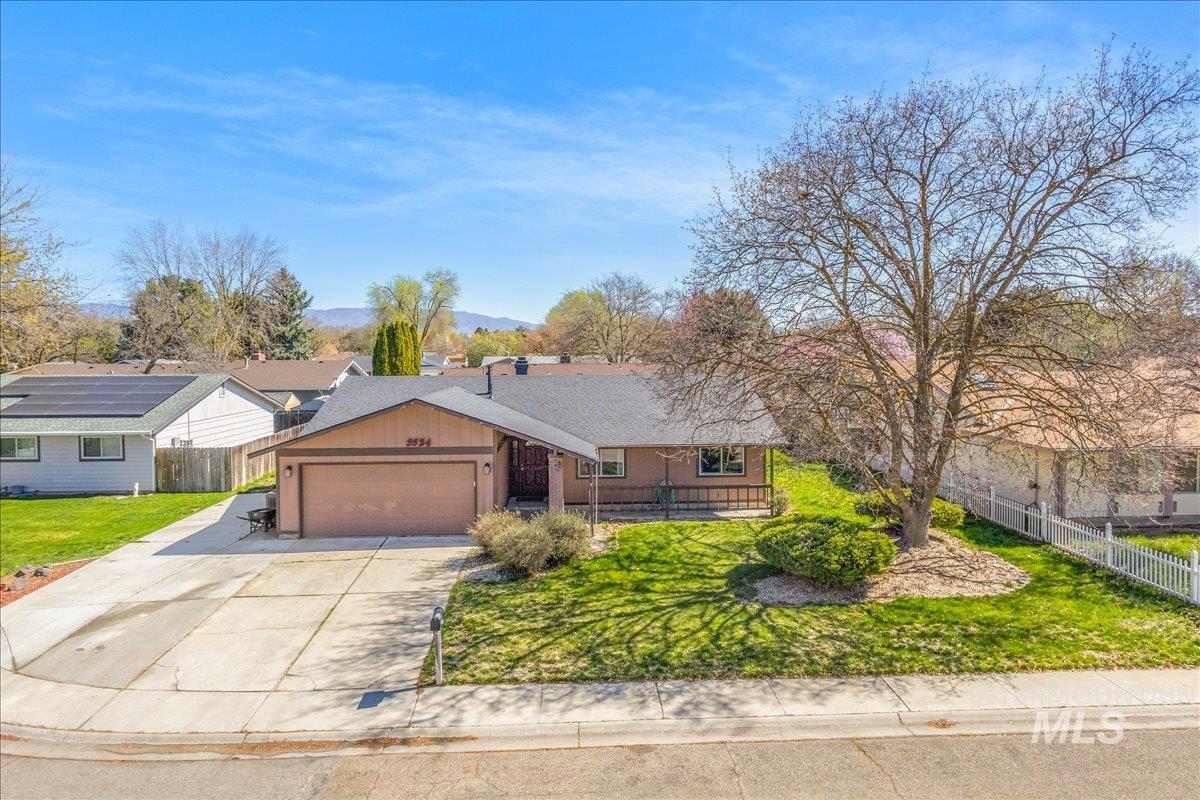 3534 Payne Place Boise, ID 83704 - Photo 1 of 1 Ranch-style house featuring concrete driveway and an attached garage