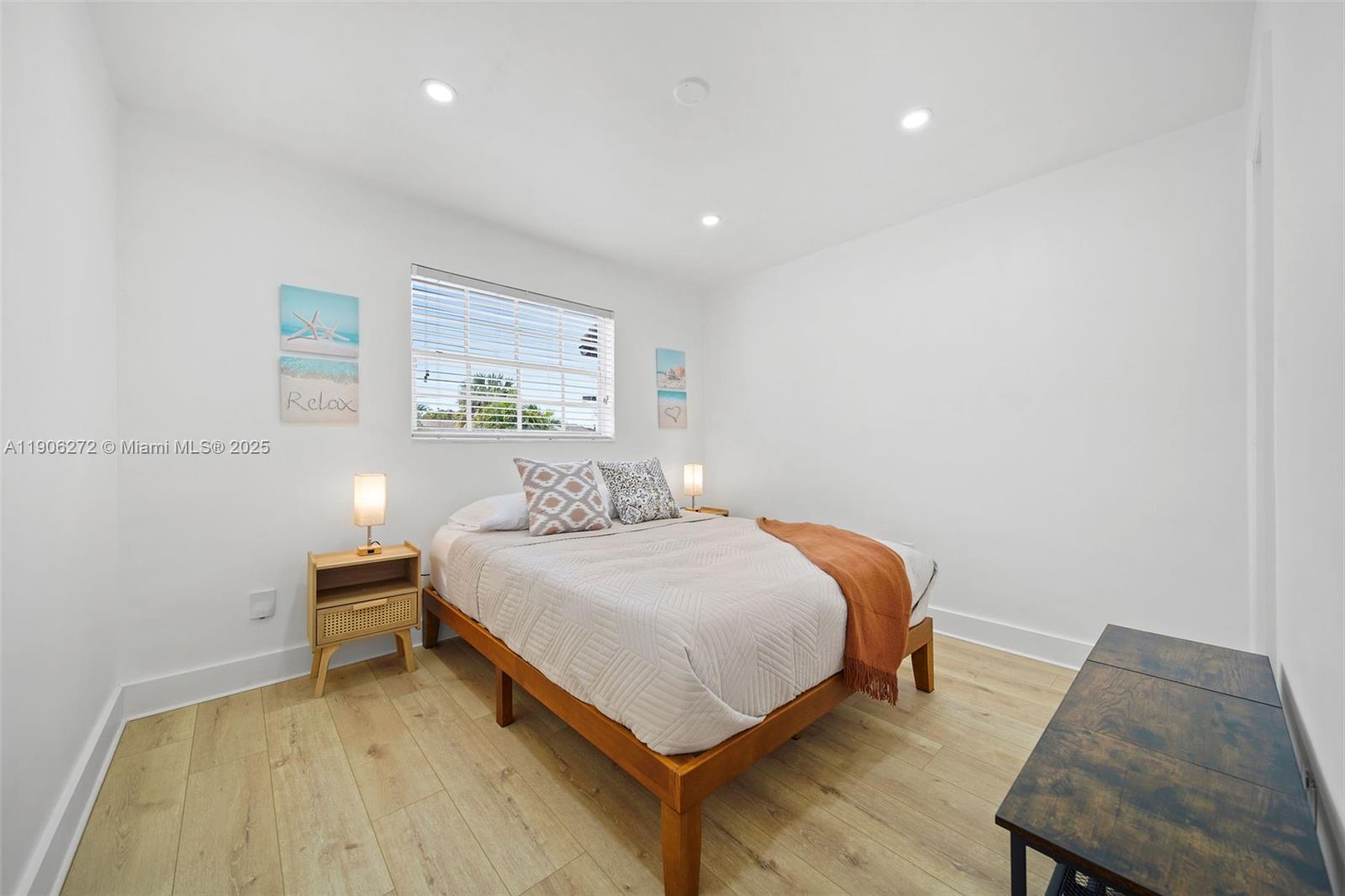 2761 Southwest 92nd Place Miami, FL 33165 - Photo 12 of 19 a bedroom with a bed and a chair