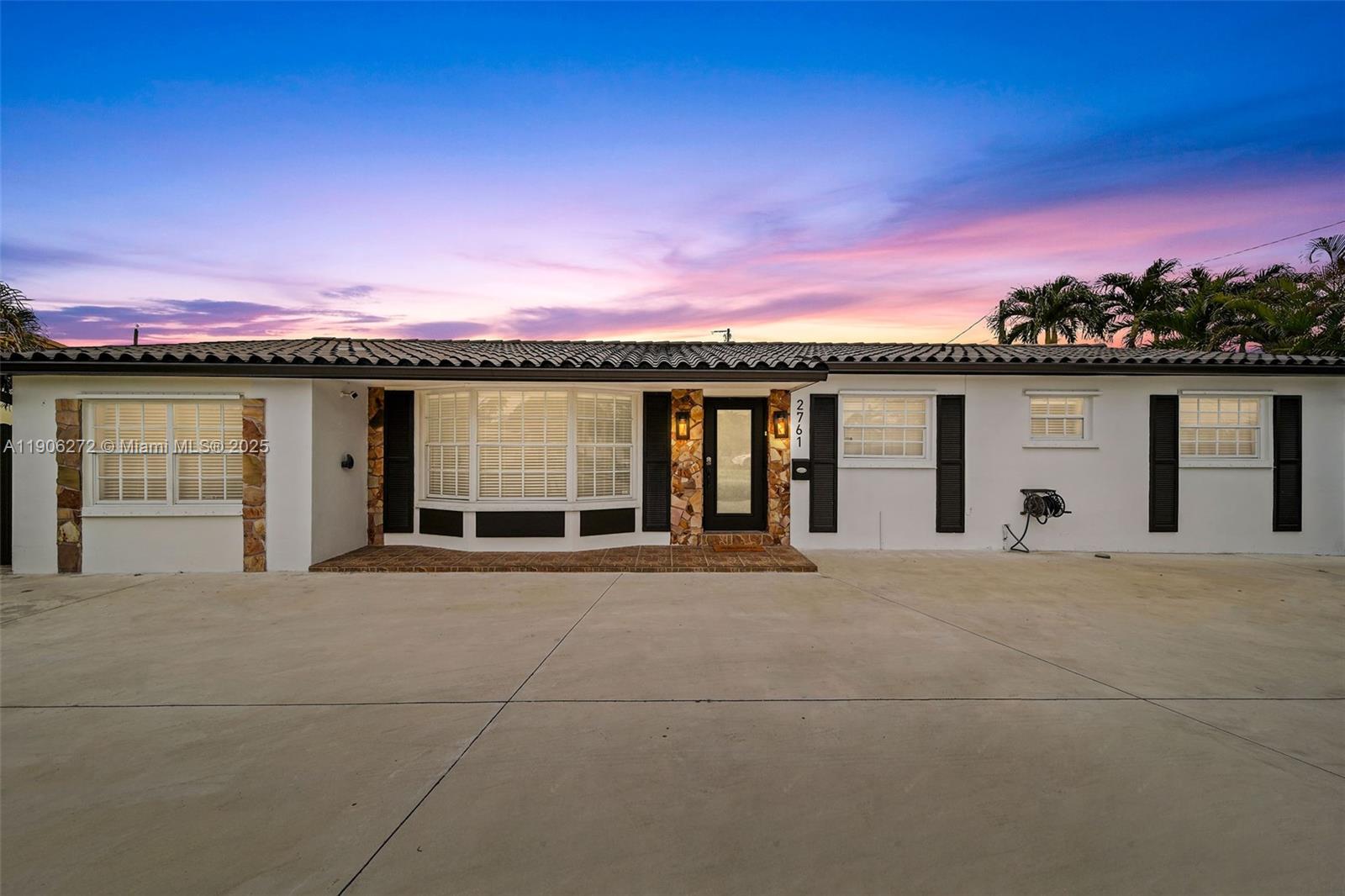 2761 Southwest 92nd Place Miami, FL 33165 - Photo 17 of 19 a view of a house with a outdoor space