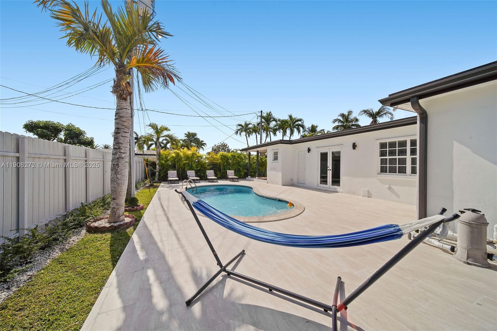 2761 Southwest 92nd Place Miami, FL 33165 - Photo 18 of 19 a view of a backyard with potted plants