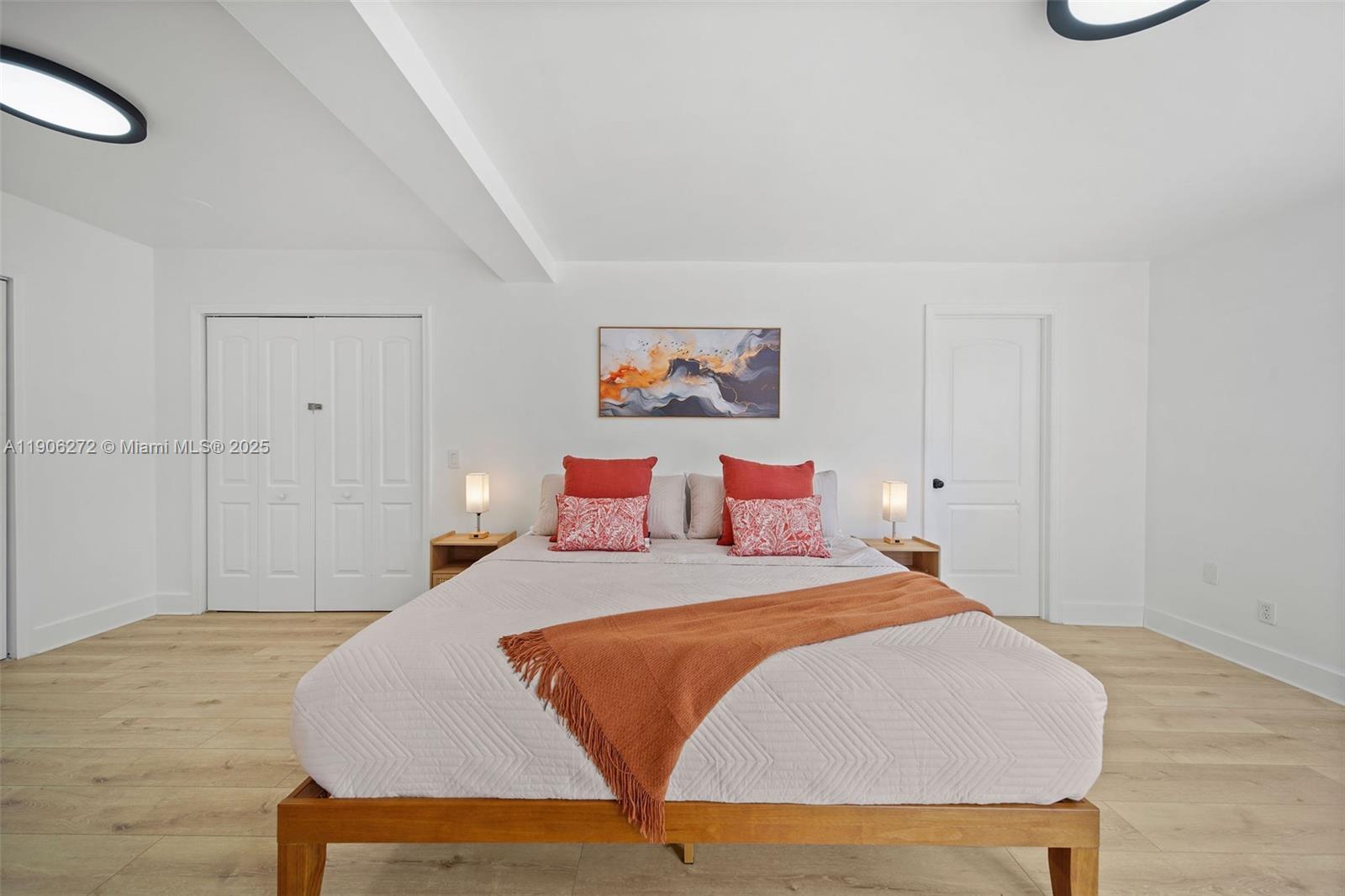 2761 Southwest 92nd Place Miami, FL 33165 - Photo 9 of 19 a bedroom with a bed and a painting on the wall