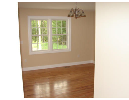 479 Montgomery Road Westfield, MA 01085 - Photo 5 of 11 a view of an empty room with wooden floor