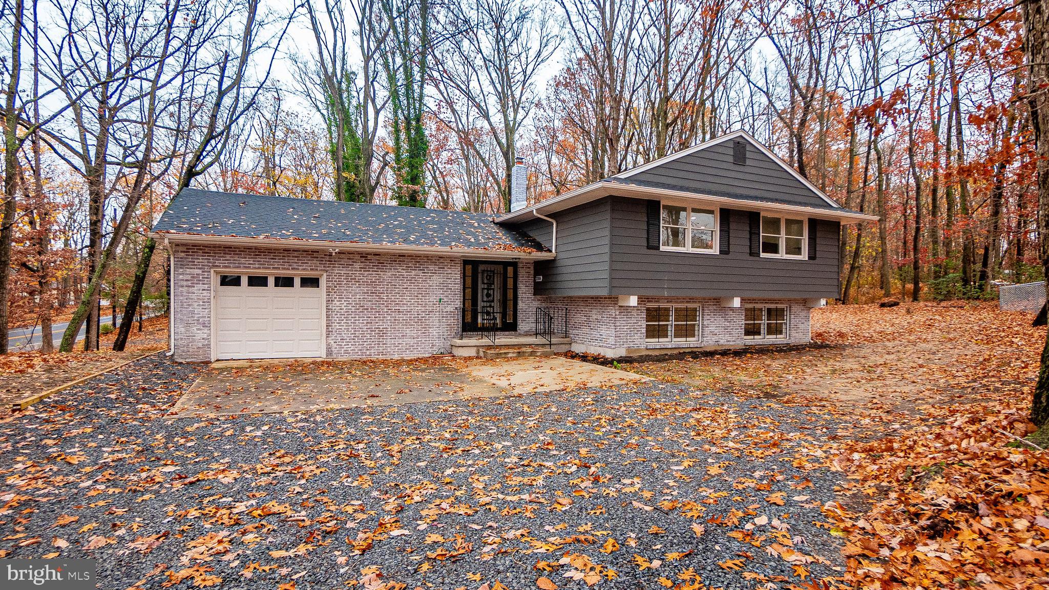 2306 Peter Cheeseman Road Sicklerville, NJ 08081 - Photo 1 of 26 a front view of a house with a yard