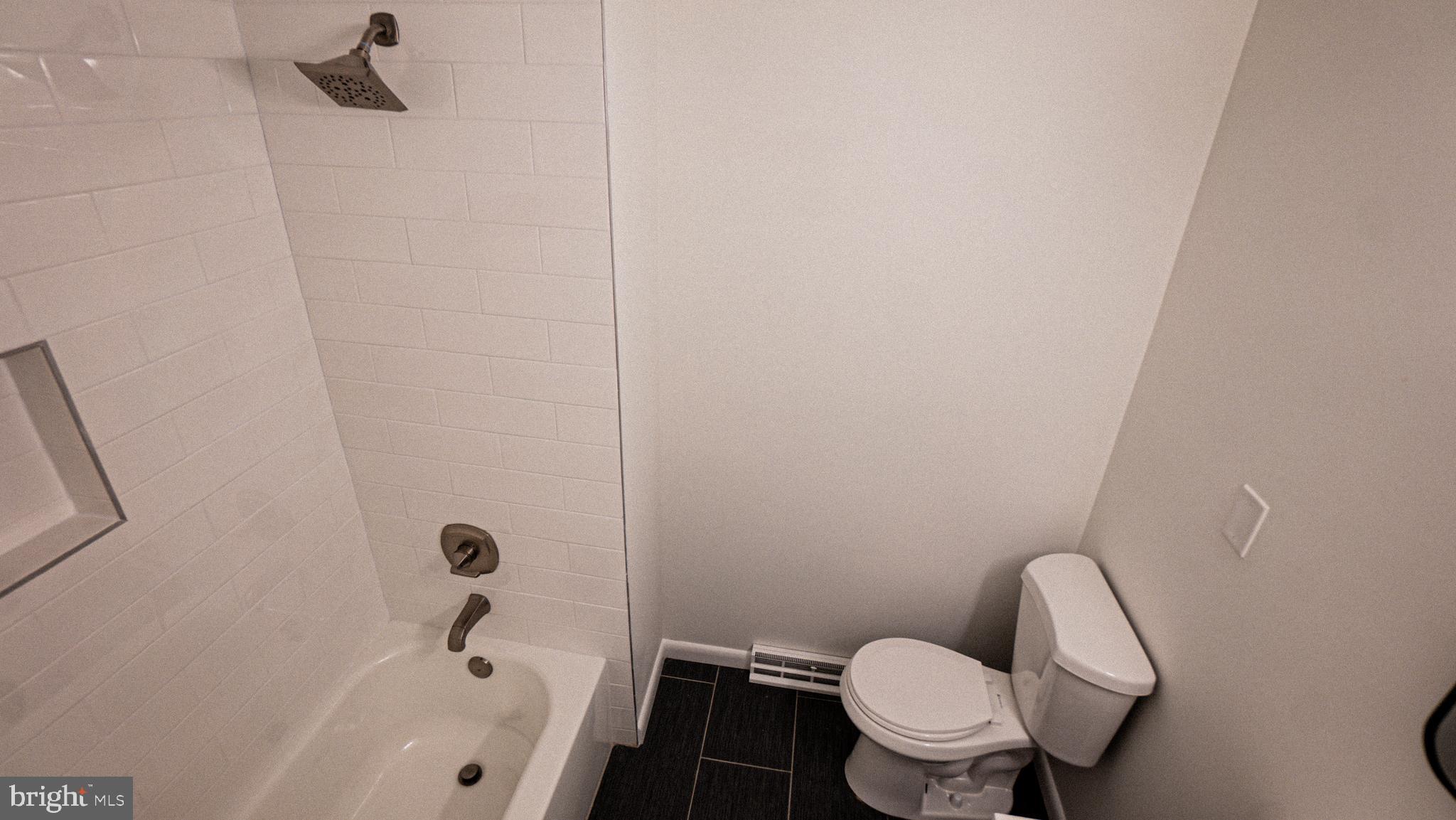 2306 Peter Cheeseman Road Sicklerville, NJ 08081 - Photo 12 of 26 a bathroom with a sink and a toilet