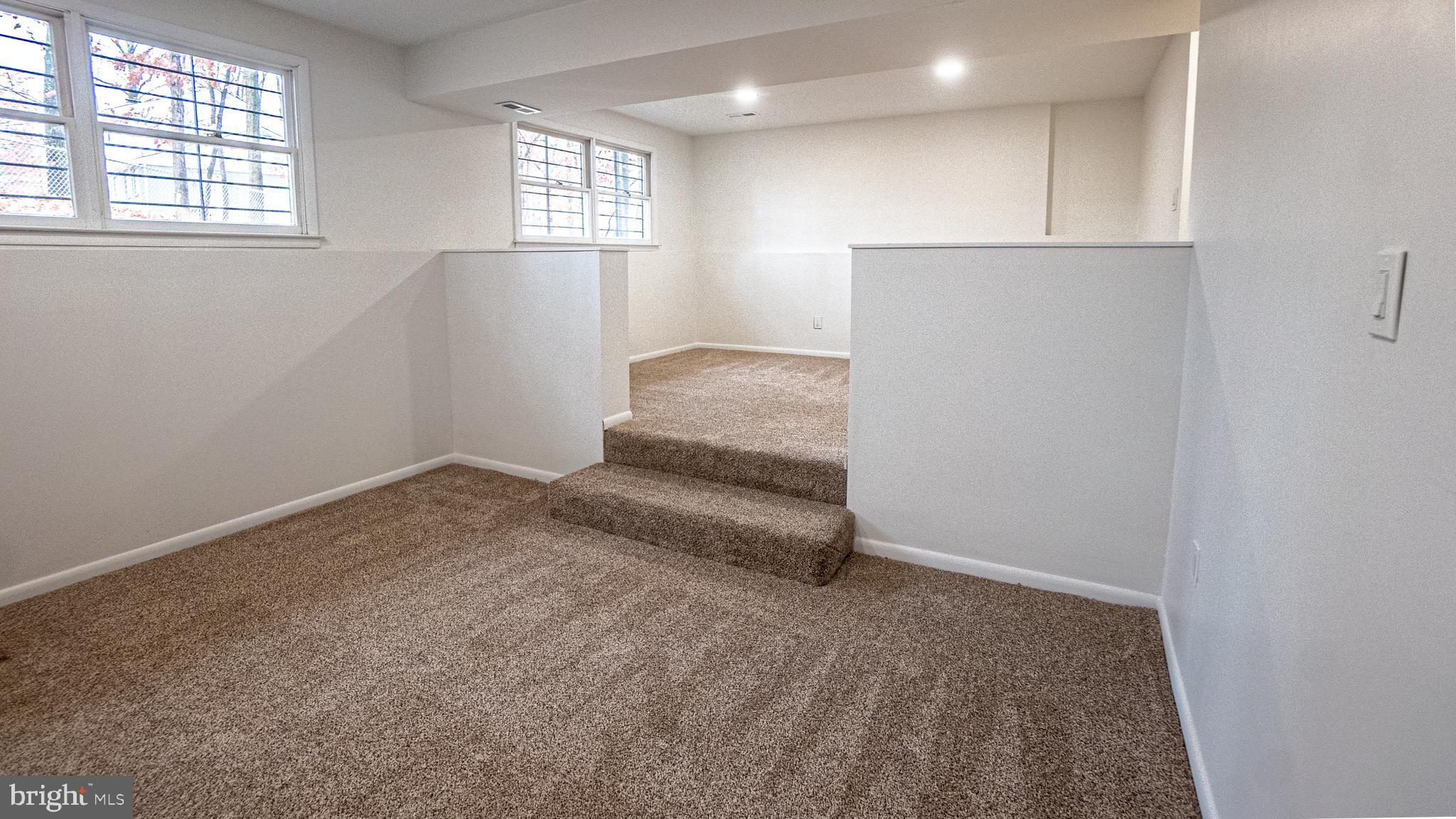 2306 Peter Cheeseman Road Sicklerville, NJ 08081 - Photo 20 of 26 an empty room with windows