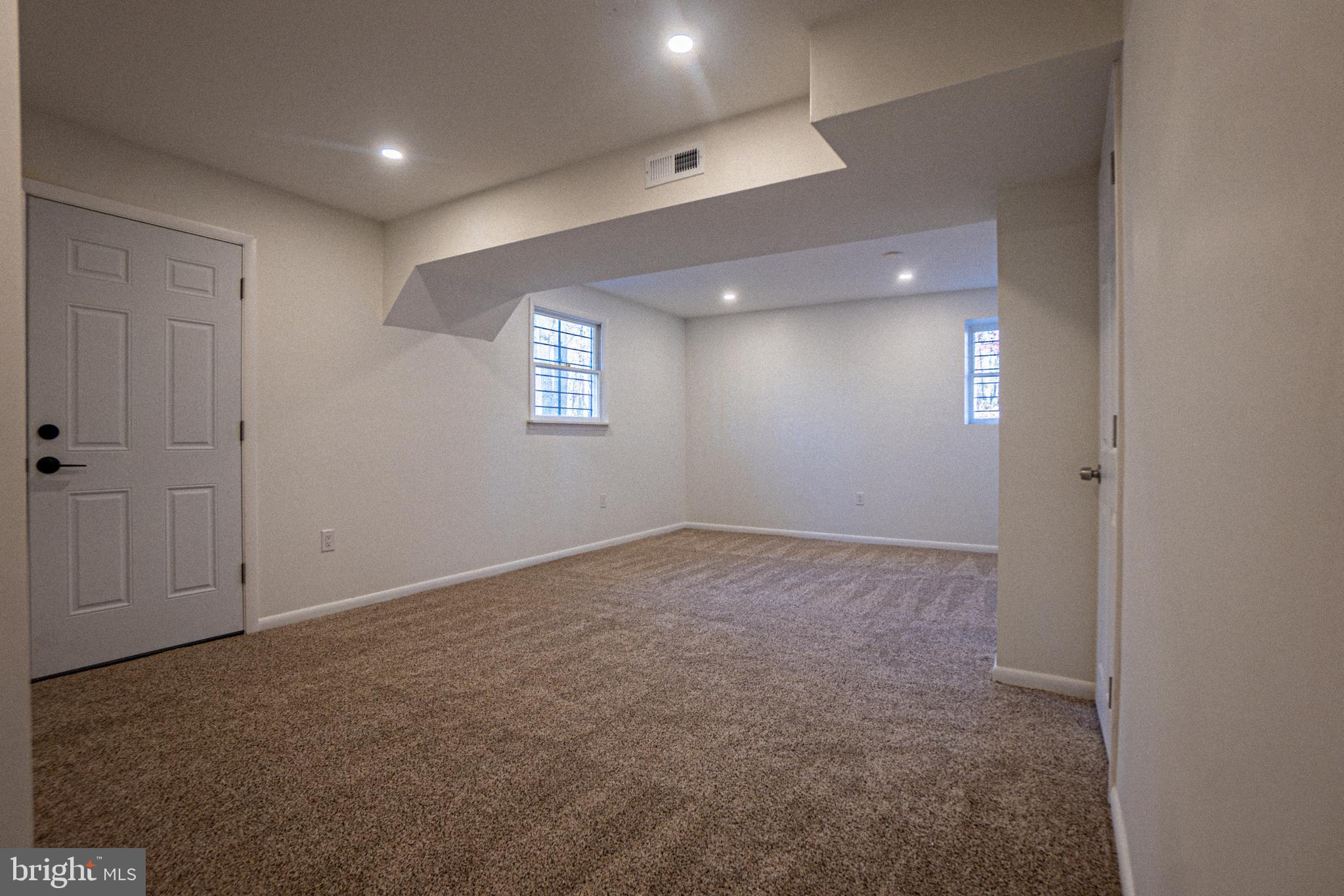 2306 Peter Cheeseman Road Sicklerville, NJ 08081 - Photo 25 of 26 en empty room with windows and closet