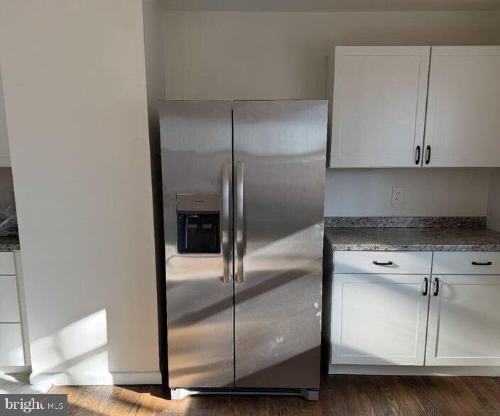 2306 Peter Cheeseman Road Sicklerville, NJ 08081 - Photo 26 of 26 a kitchen with a refrigerator and white cabinets