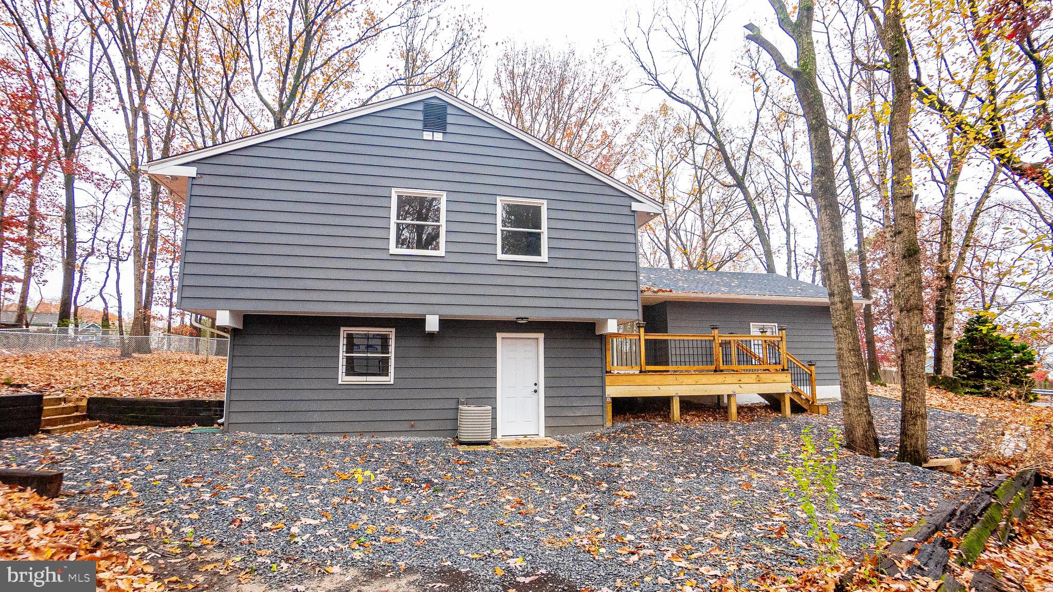 2306 Peter Cheeseman Road Sicklerville, NJ 08081 - Photo 3 of 26 a front view of a house with a yard